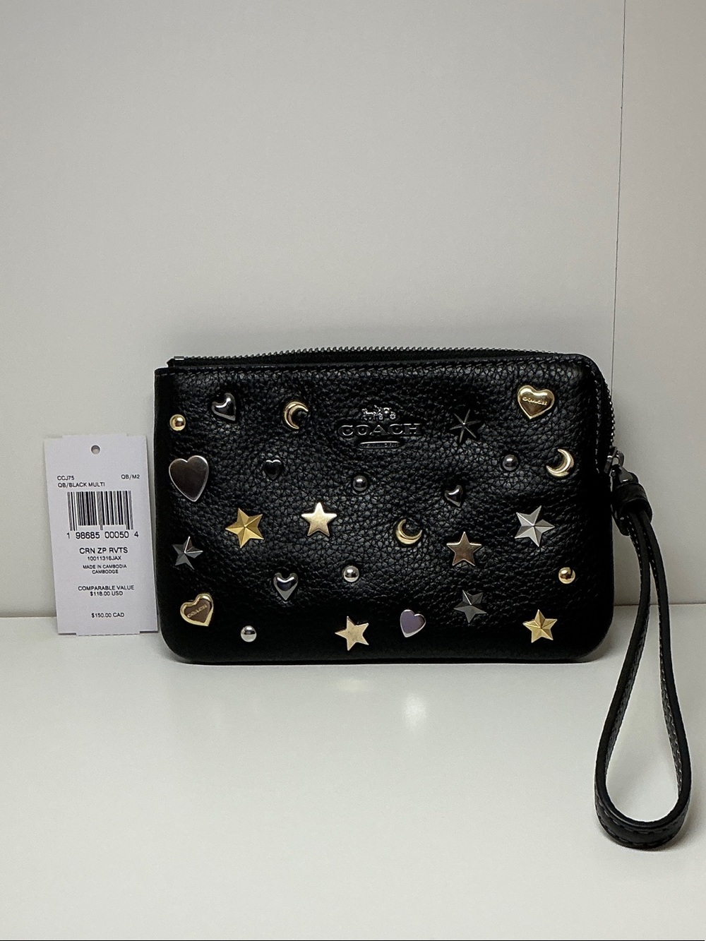 Coach Black Pebbled Leather Wristlet with Mixed Metal Star & Heart Studs